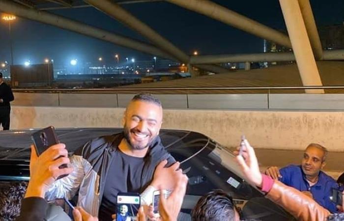 #اليوم السابع - #فن - صور.. استقبال حافل لـ تامر حسنى بمطار القاهرة بعد دخوله موسوعة جينيس
